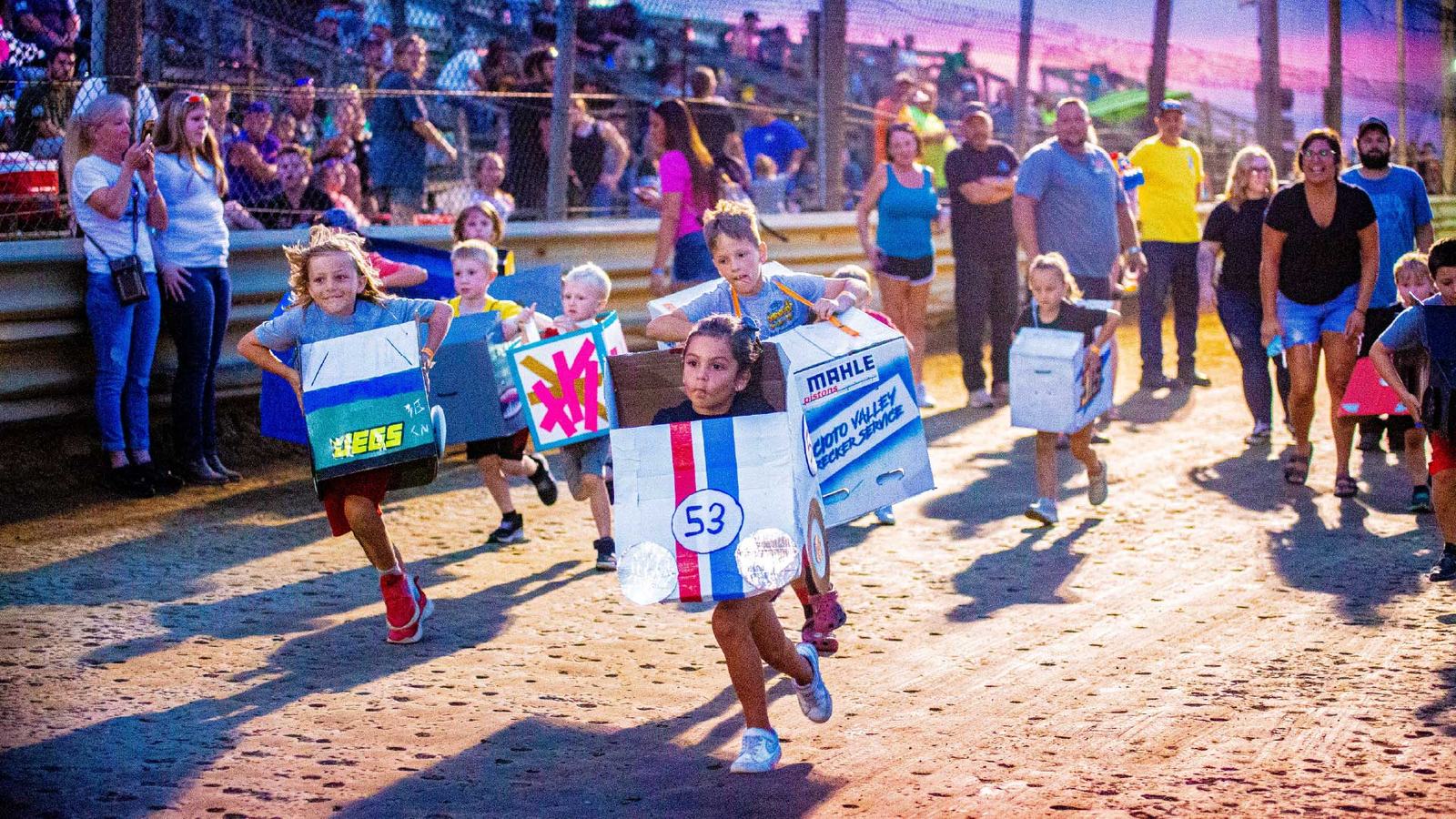 Young fans on the front stretch
